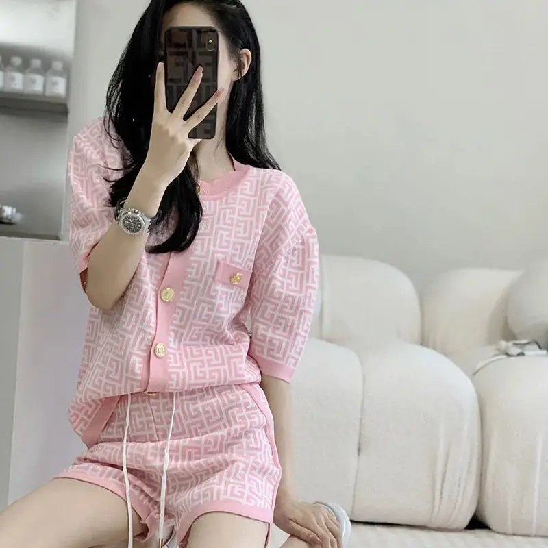 

2021 Korean version of the new Sakura Pollen full print fashion personality Cardigan knit leisure suit two-piece set with women