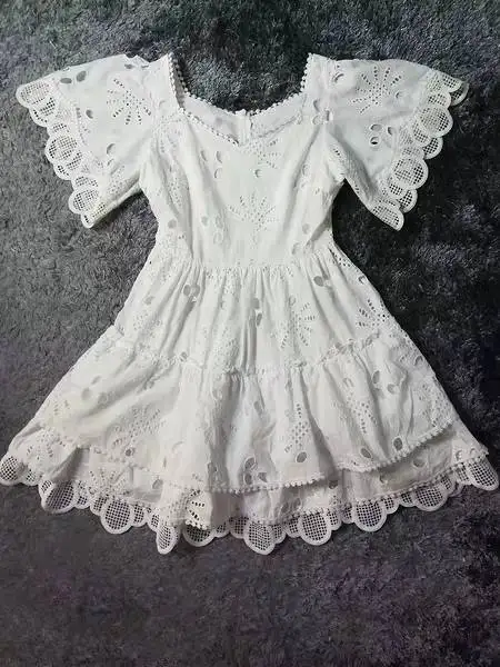 

YAMDI Embroidered lace party dress Tiered ruffled layers chic women dress white cotton summer dress 2020 new lace hollow out new