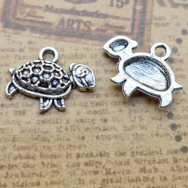 

Designer Charms Tortoise Charms Antique Silver Color 13x17mm 20 Pieces
