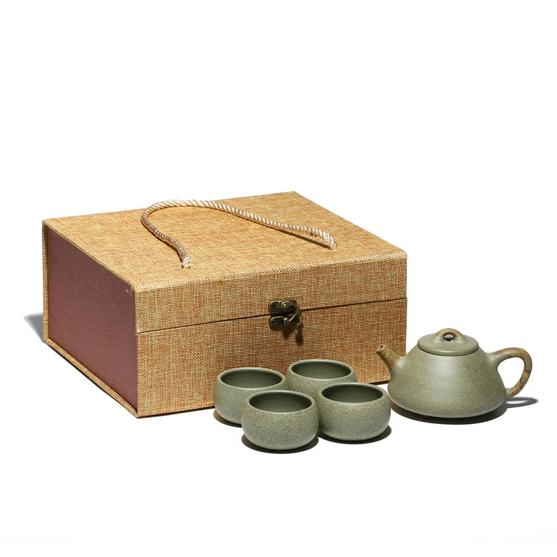 

twisted clay and stone ladle pot, one pot with green pea and stone ladle pot, one pot with Kung Fu teapot and tea set