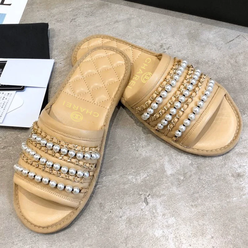 

Summer 2021 new black small fragrance sheepskin slippers women leather wear pearl chain sandals casual Roman beach flat shoes