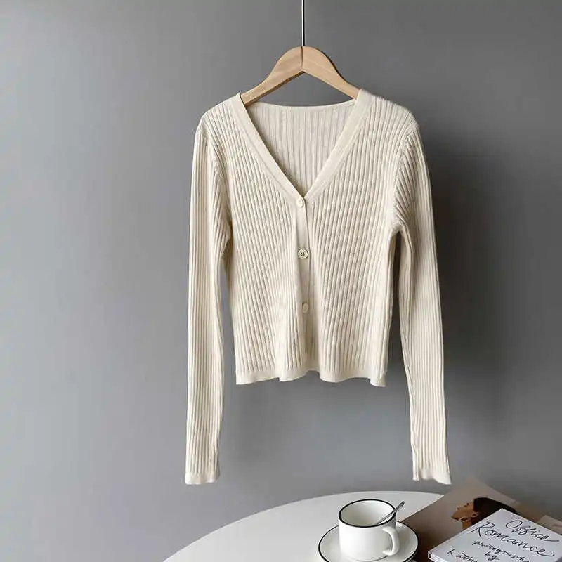 

COZOK Korea Early Spring V-neck Knitted Cardigan Female 2021 Slim Long Sleeve Thin Short Coat Xs9285