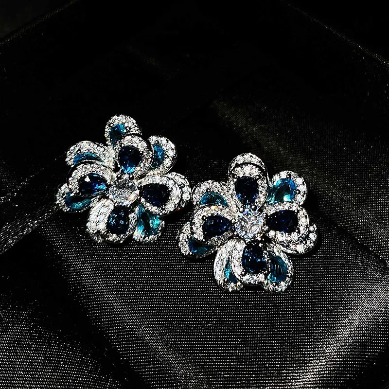 

Independent design silver inlaid colorful zircon flower earrings simple three-dimensional camellia shape ladies jewelry