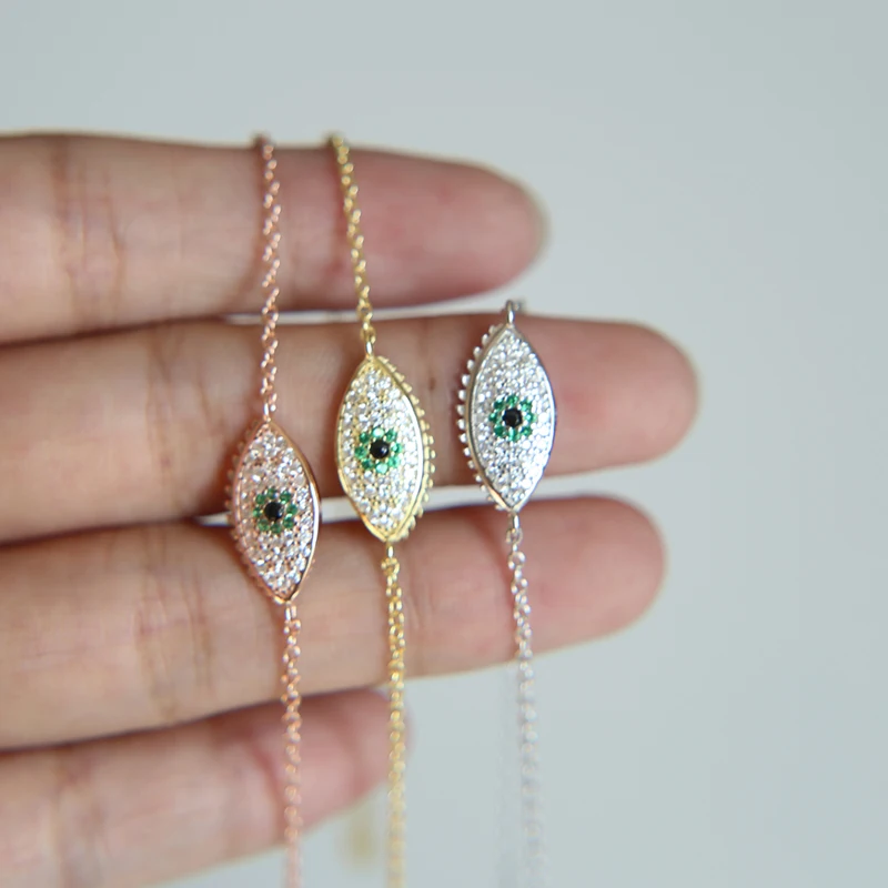 Браслет с серебряными глазами браслет зелеными и прозрачными кубическими