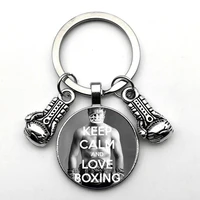 unique essential keychain occupation boxing gloves keychain gloves pendant convex round glass keychain inspirational personality