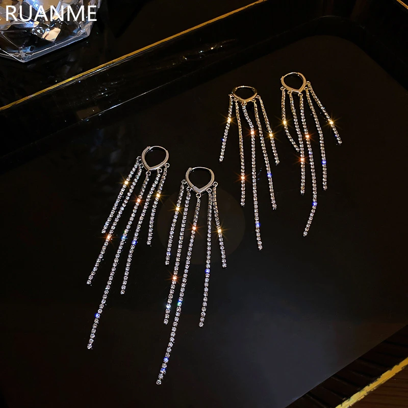 

Женские серьги-кисточки со стразами