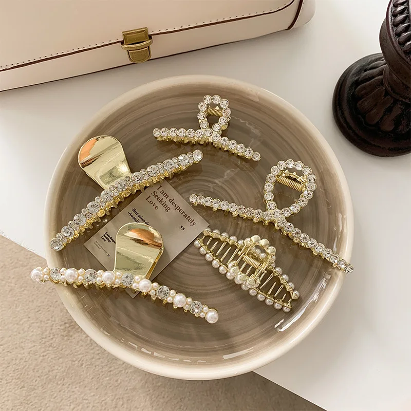 

U-Magical Korean Rhinestone Geometrical Hair Claw for Women Gold Metallic Simulation Pearl Shark Hair Clamps Hair Accessories