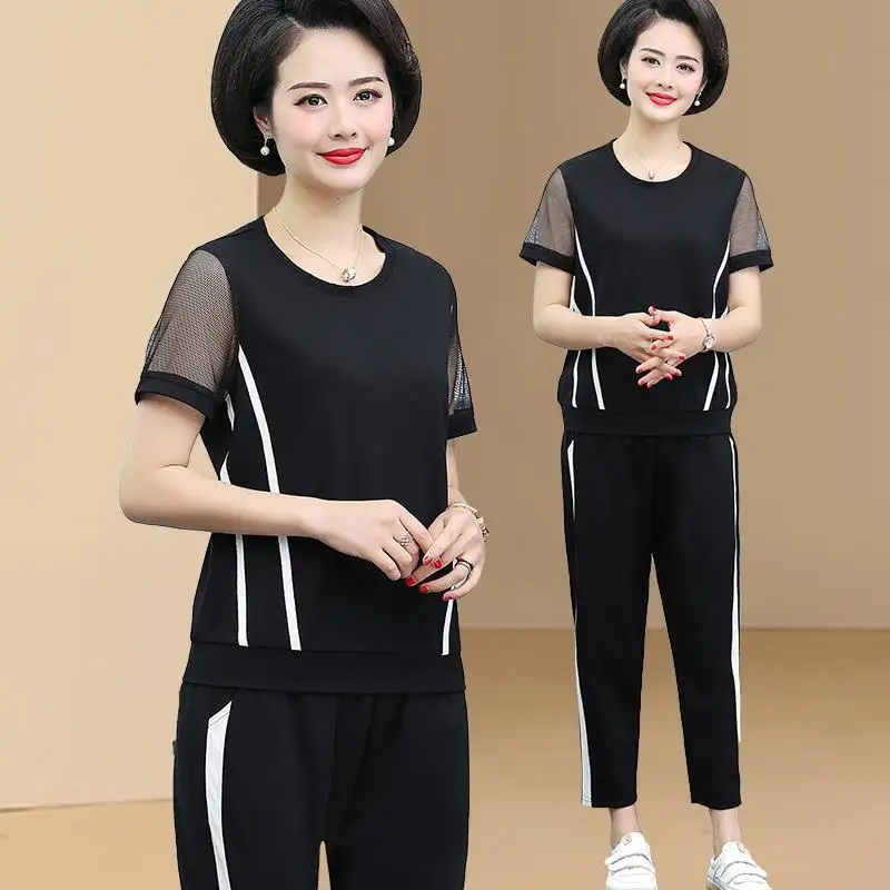 

2022 New Summer Tracksuit Women Short Sleeve Tops and Casual Pants Suits Casual Sport Black 2 Piece Sets Womens Outfits Y898
