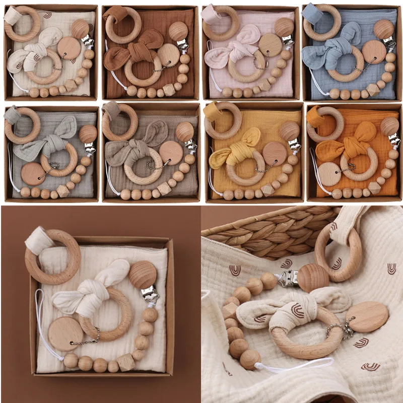 

1 set Bunny Ear Wooden Ring Baby Teether Cotton Baby Bibs Newborn Saliva Towel Pacifier Clips Chain Set Baby Gym Molar Bracelet