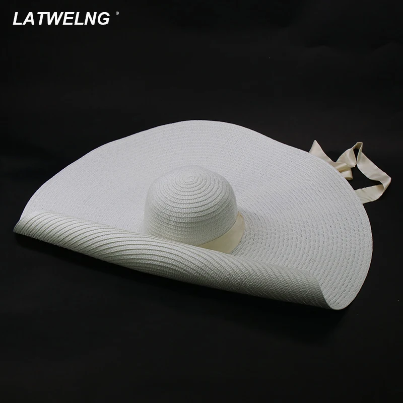 

2021 Long Ribbon Oversized Sun Hats For Women Big Brim Beach Hats Fashion Modeling Hat Travel Sunscreen Vacation Hat Wholesale