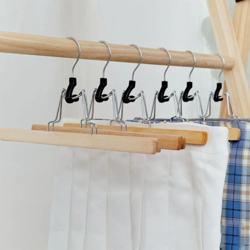 

Grade Wooden Pants Hangers with Clips Non Slip Skirt Hangers, Smooth Finish Solid Wood Jeans/Slack Hanger with 360° Swivel Hook