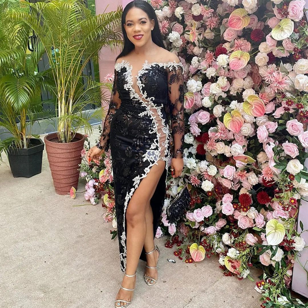 

Sexy Black Mermaid Aso Ebi Party Dresses Long Sleeves See Through Illusion Front White Lace Appliques Sequins Evening Gowns