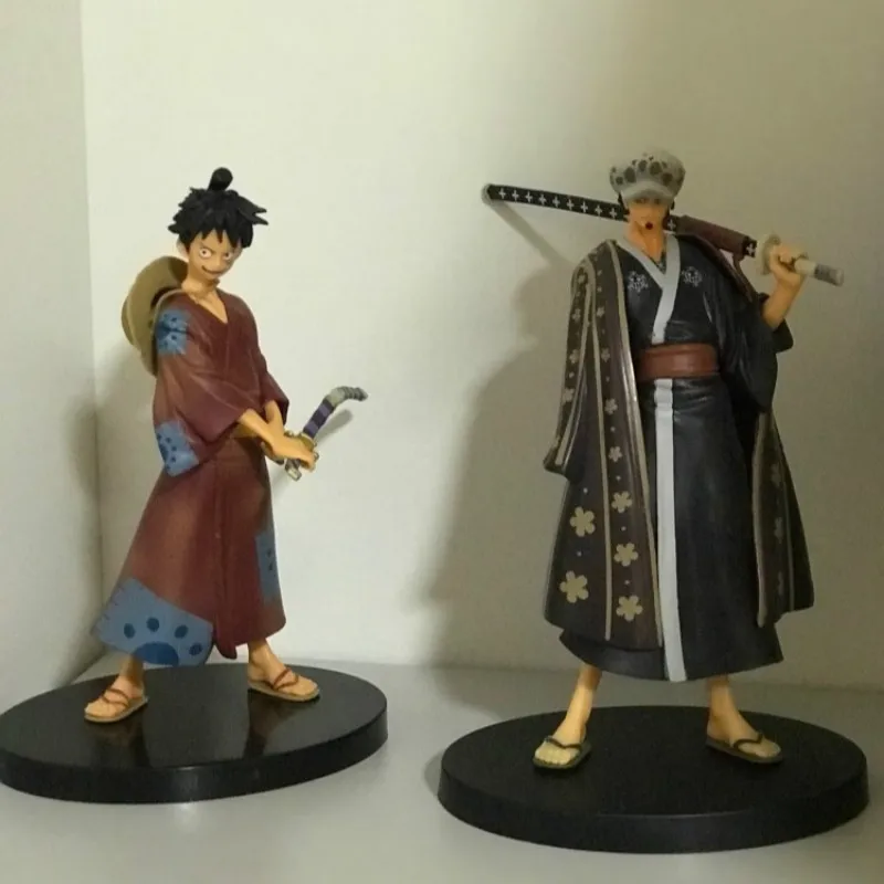 

4pcs/ lot One Piece Anime Grandline Men Luffy Roronoa Zoro Vinsmoke Sanji Trafalgar Law Land of Wano Country Action Figure Toys