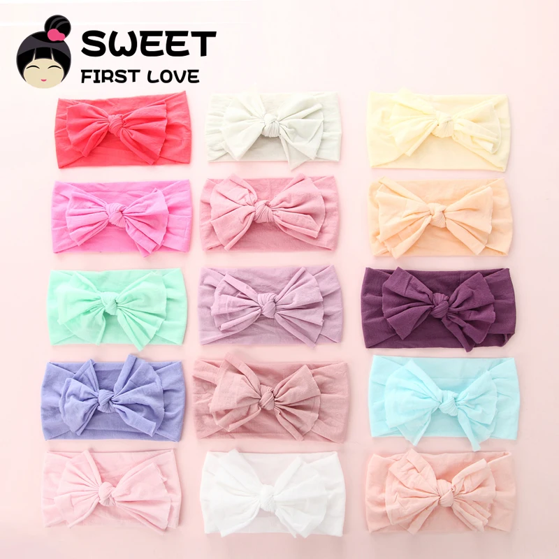 Повязка на голову женская с большим бантом нейлоновая мягкая эластичная лента