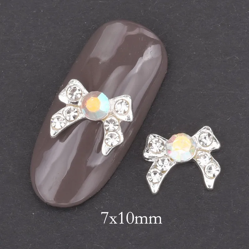 10pcs Strass 3d Nail Bow Tie AB White Rhinestone Pearl Design Nail Art Decoration Glamour Silver Alloy Jewelry Nail QB028-029 - Цвет: QB029
