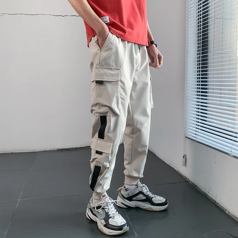 

Джоггеры мужские с лентами, брюки-карго, уличная одежда 2021, повседневные хлопковые тренировочные штаны в стиле хип-хоп с карманами, модные б...