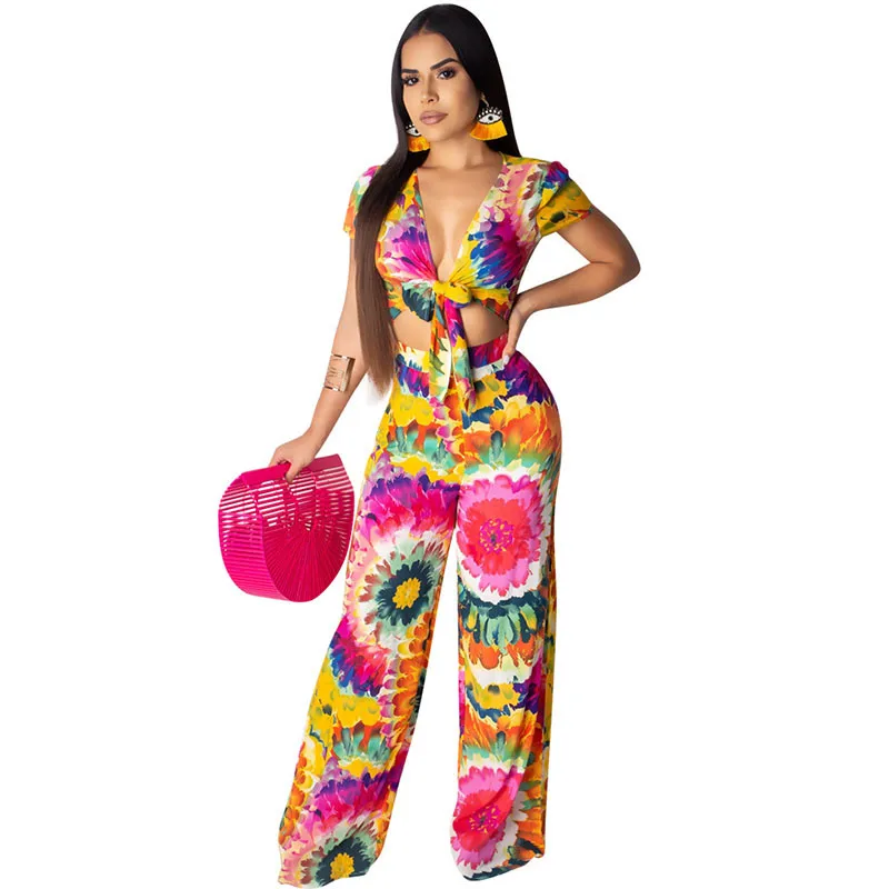 

Women Bohemian Colorful Floral Print Jumpsuit Loose Wide Leg Pants Romper Sexy V-neck Bow Tie Up Hollow Out Summer Beach Overall