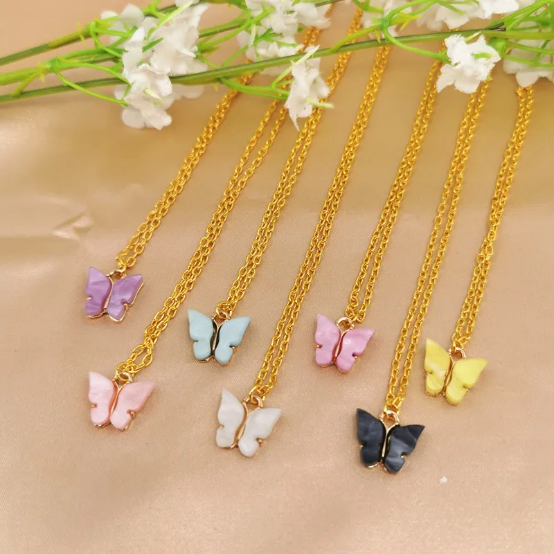 Женское колье-чокер с бабочкой золотистого/серебристого цвета массивное