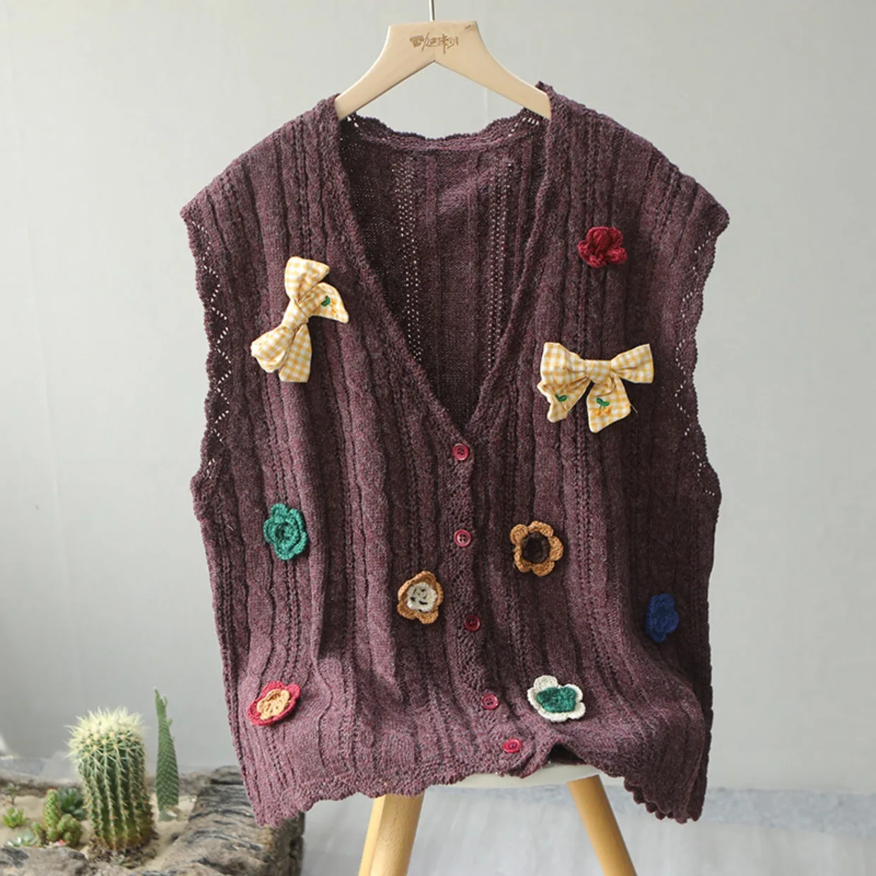 

2021 new Japanese v-neck knitted vest Sen-line wild loose bow sleeveless sweater cardigan waistcoat