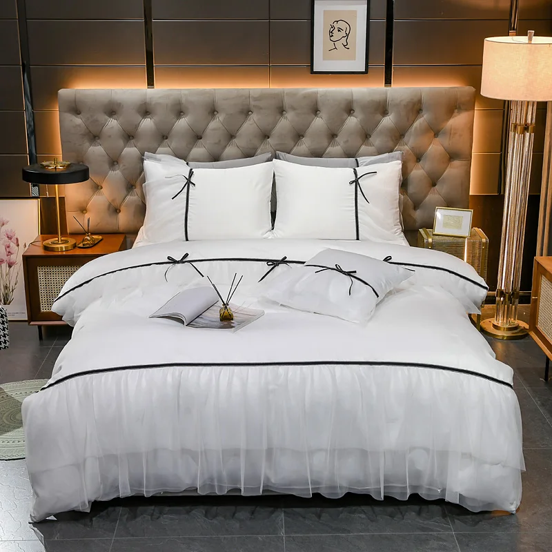 

Summer ice silk quilt cover four white ins princess wind lace fairy washed silk sheets on the bed. 4