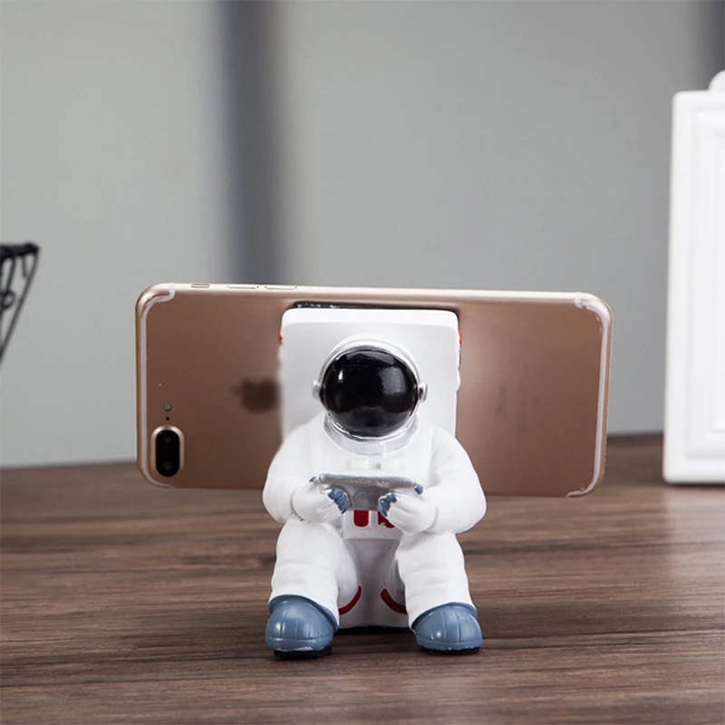 homhi astronaut mobile phone holder creative resin spaceman figurine statue nordic home room decoration accessories hbj 038 free global shipping