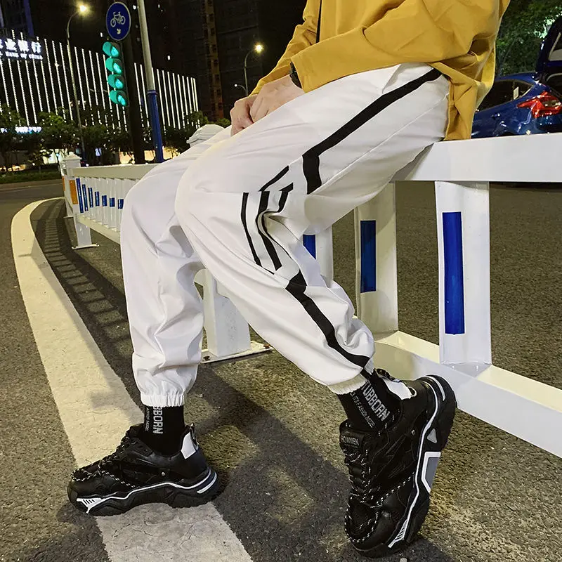 

2021 summer New casual sports pants men's loose leggings nine-point thin section Korean version black hip-hop Free shipping