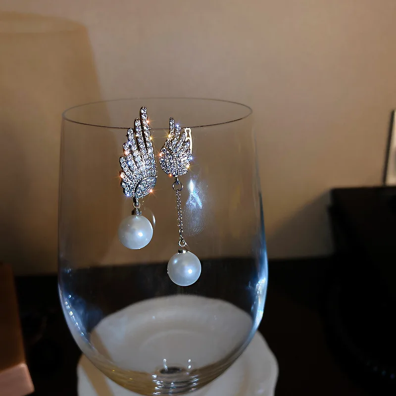 

Cute Female Crystal Wing Drop Earrings Trendy Silver Color Dangle Earrings Dainty Bridal White Pearl Wedding Earrings For Women