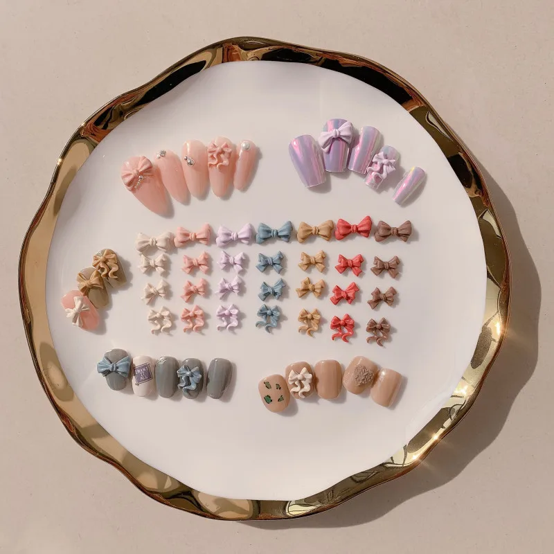 

100 шт. бант для дизайна ногтей Готовые ювелирные изделия из смолы Мягкий Резиновый кончик пальца Маленький бант можно перемещать и изогнуть
