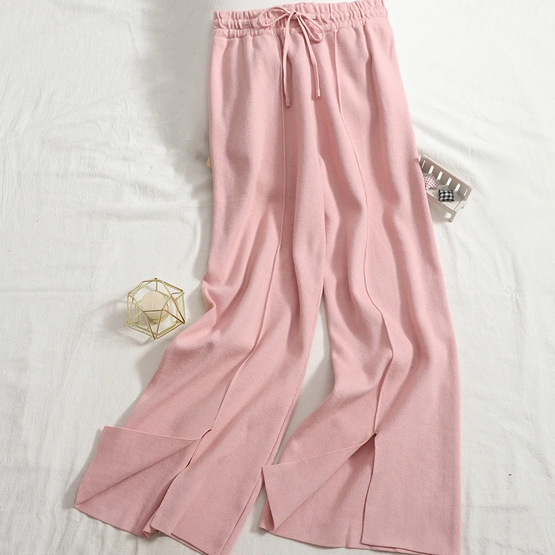 

Брюки женские трикотажные однотонные с поясом на резинке и разрезом