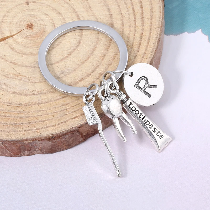

Creative Personality Teeth Toothbrush Toothpaste Keychain Appeal Care Dental Health Doctor Nurse Family Friend Jewelry