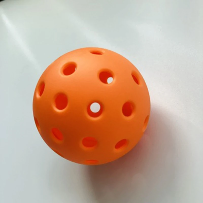 

Pickleball Yellow Indoor Plucking Ball with 26 Holes Orange Outdoor Plucking Ball with 40 Holes