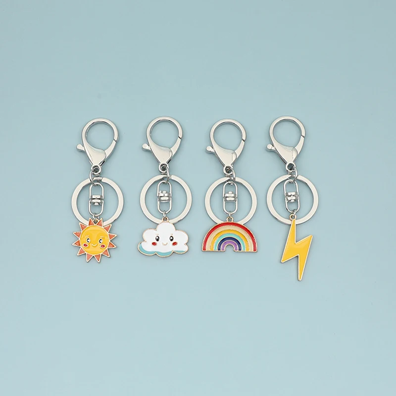 

New Cartoon Sun Cloud Rainbow Lightning Keychain Cute Sun Cloud Car Keyring Charm Bag Pendant Rainbow Lightning Metal Key Chains