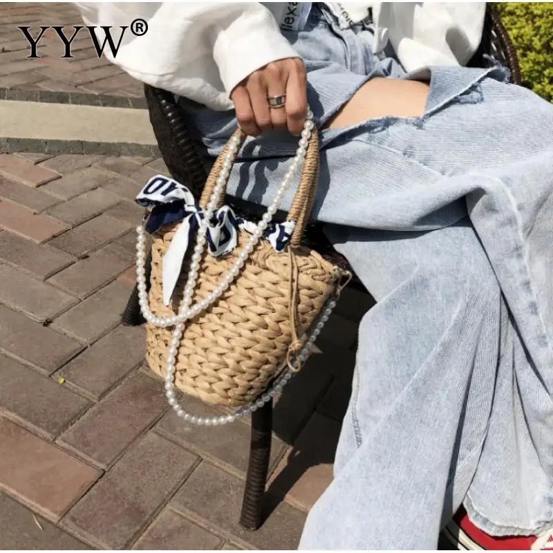 

Leisure Handbags for Women 2021 Designer Luxury Straw Bucket Bag Summer Pleated Handlebag For Women Woven Tote with Pearl Chain