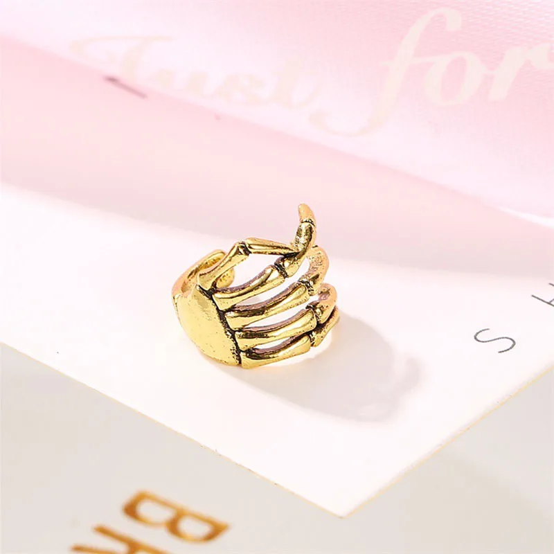 

GorGor Clip Earrings Women Originality Statement Minimalist Skeleton Hand Ear Bone Punk Style Creative Party Jewelry 19041598