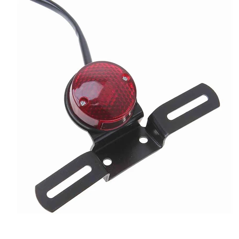 

Motorcycle LED Retro Red Rear Tail Brake Stop Light Circle Lamp with License Plate Mount for Harley Honda Suzuki Chopper Bobber