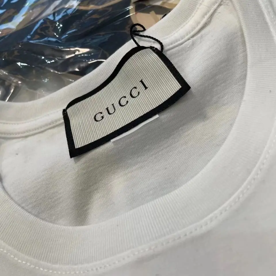 

2021 Spring and summer mascot Duola Meng cartoon blue overweight male loose casual men and women couple T-shirt short sleeve