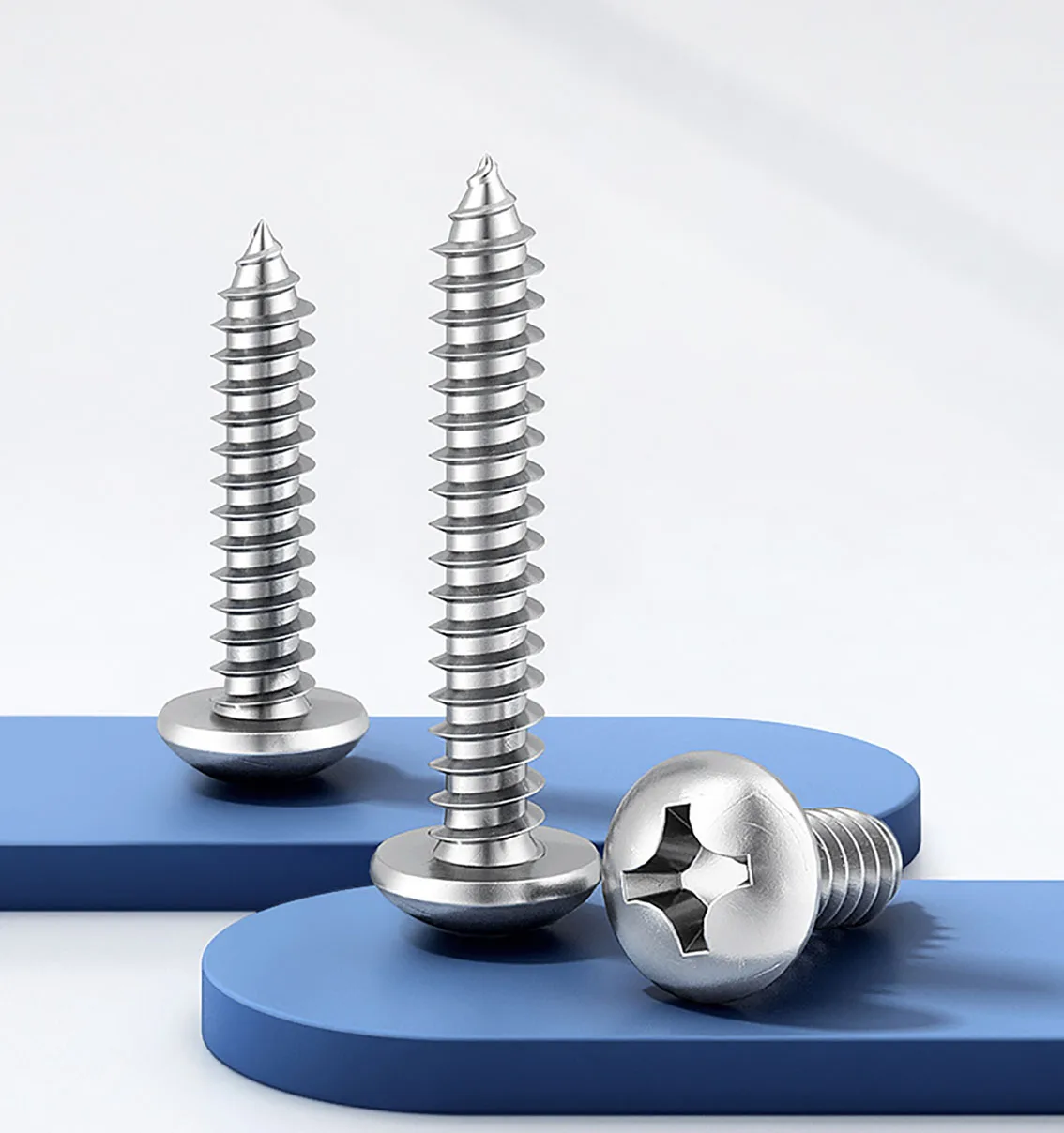 

Винты-саморезы с круглой головкой и крестообразным основанием из нержавеющей стали