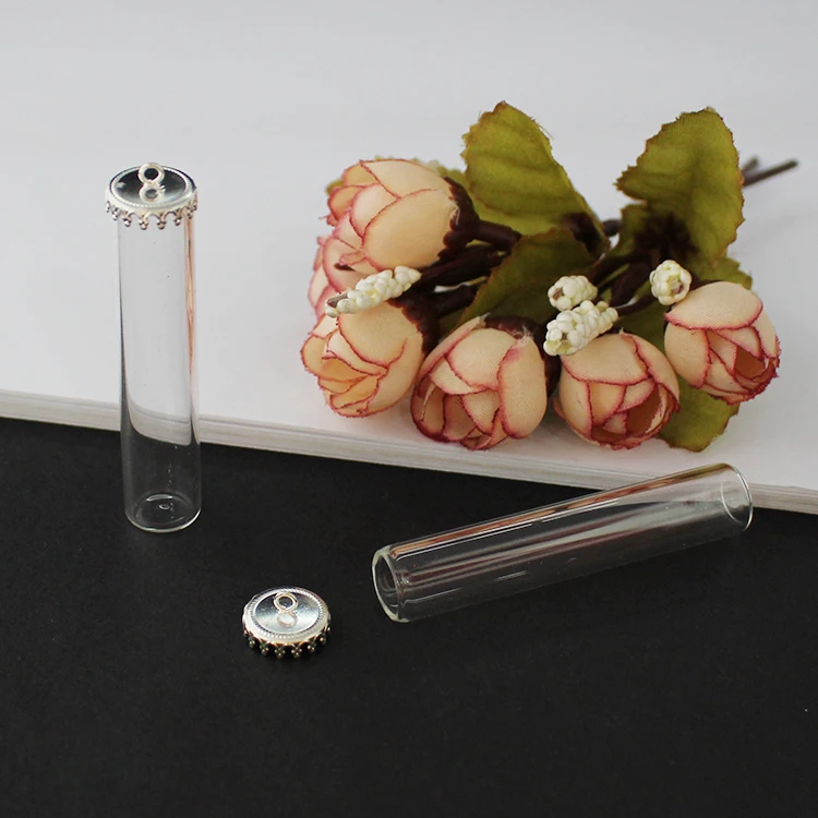 Стеклянная трубчатая бутылка с короной и металлической крышкой стеклянные