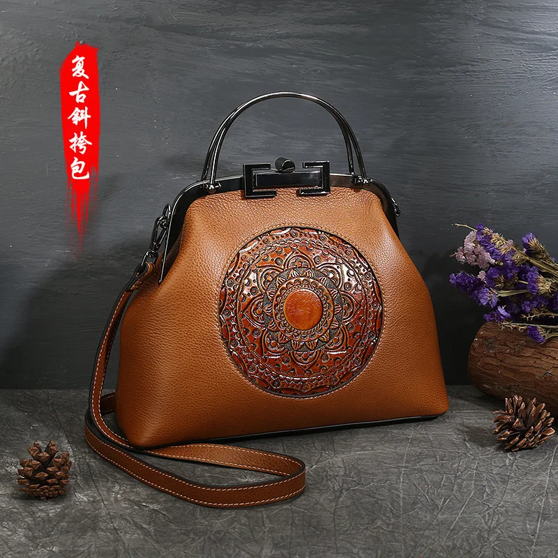 

Women's handbag totem embossed lock single shoulder bag head leather dumpling bag slant span bag