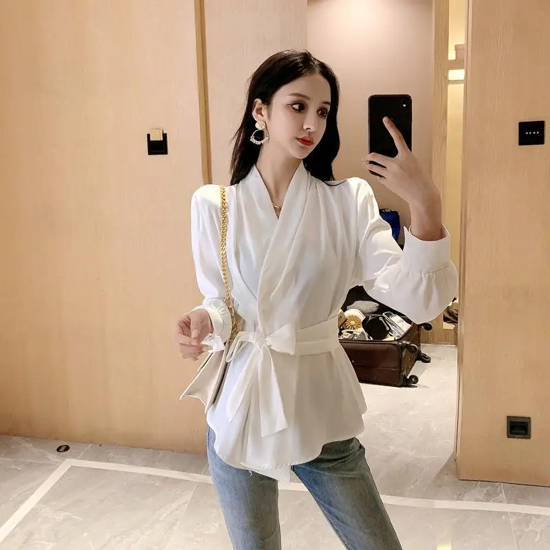 

Autumn new French style is very immortal, high cold Yujie wind solid color waist long sleeve small stand collar shirt shirt wome