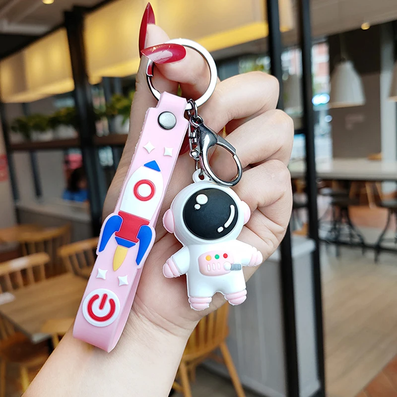 

Creative Fashion Couple Accessories Personality Car Keychain Cartoon Silicone Couple Spaceman Doll Keychain Accessories