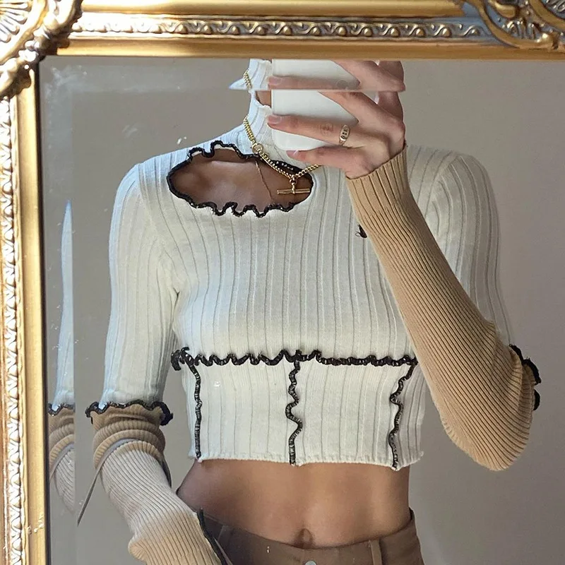 

Женский топ с длинным рукавом и высоким воротником