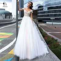 elegant wedding dresses 2021 sheer o neck cap sleeve lace appliques tulle backless a line sweep train bridal gown robe de mari%c3%a9e