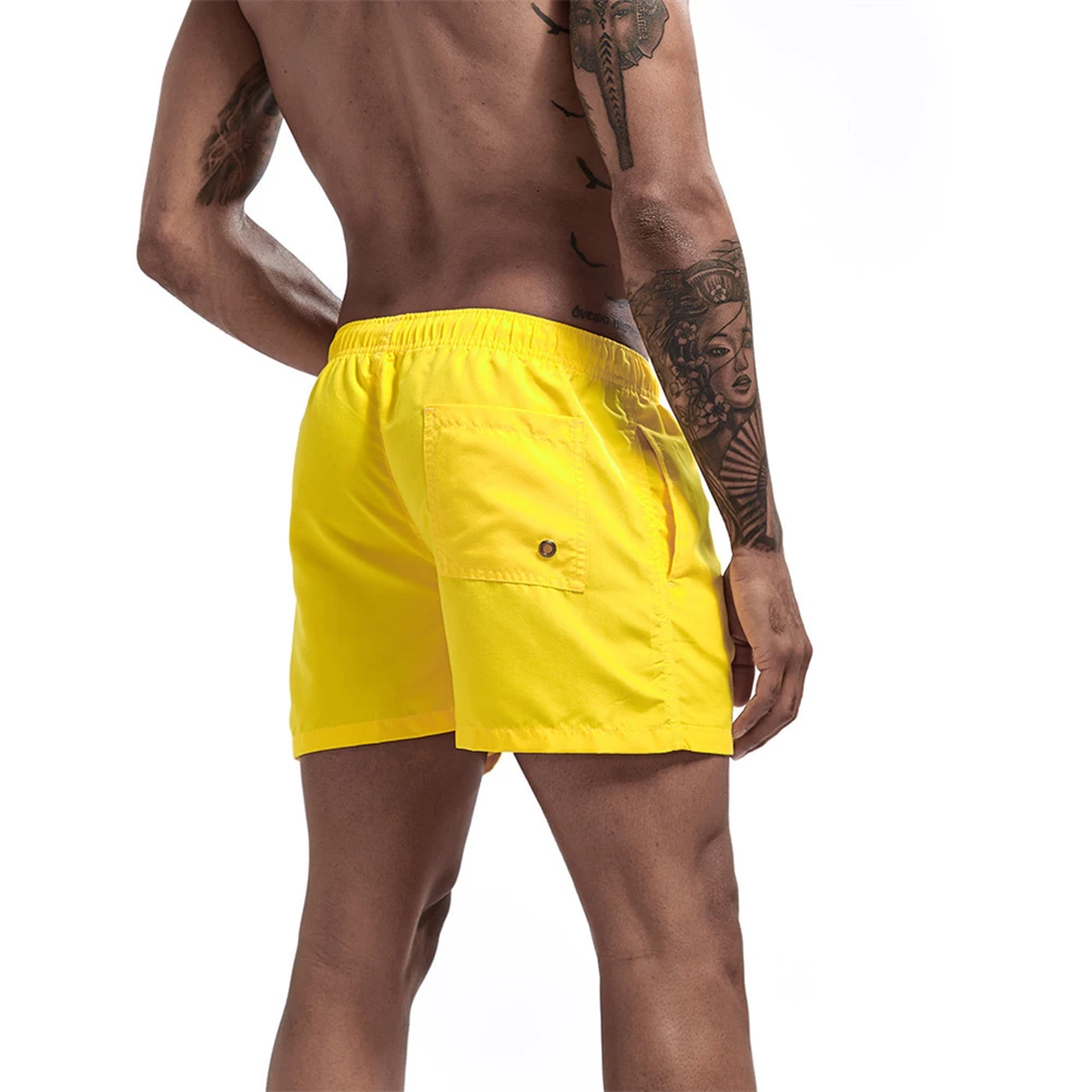 

2021 Summer Mens Beach Shorts Swimwear Matching Wear Surfing Pants Swimsuits Quick Dry Shorts Large Size Solid Color Shorts