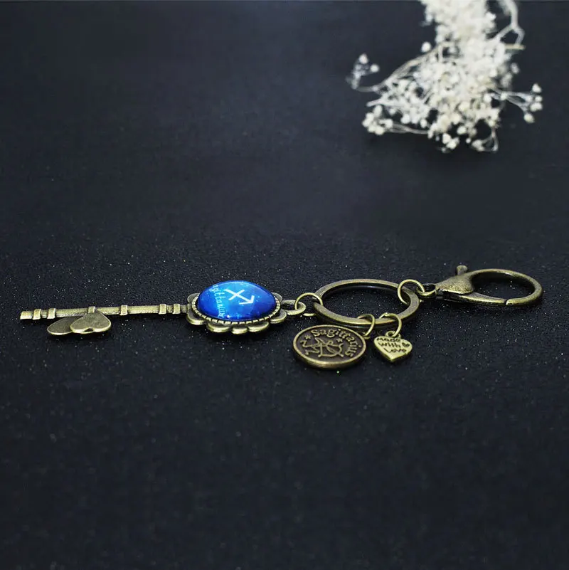 

New Hot Sale Twelve Constellation Luminous Metal Buckle Handmade Luminous Starry Sky Time Gem key Ring Car Phone Bag Jewelry