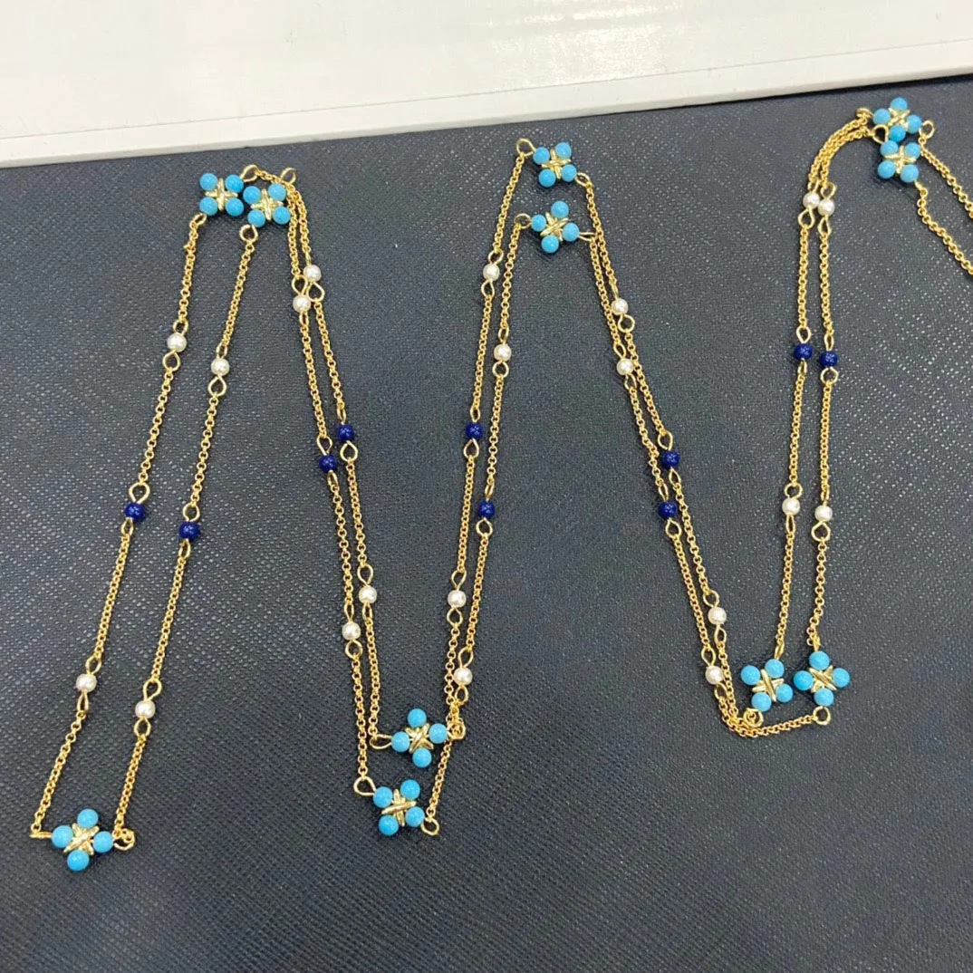 Женское ожерелье из серебра пробы с жемчугом и синим камнем | Украшения