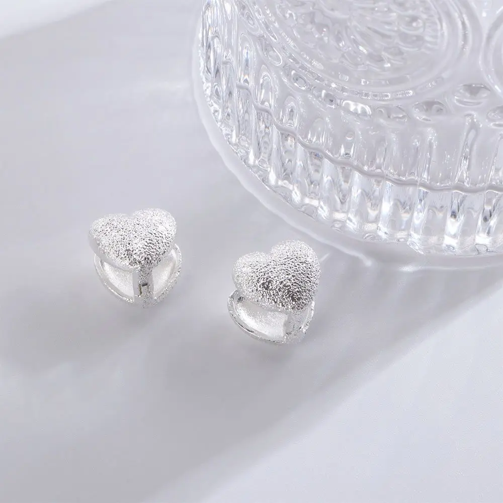 

Двусторонние женские серьги-гвоздики в виде сердца