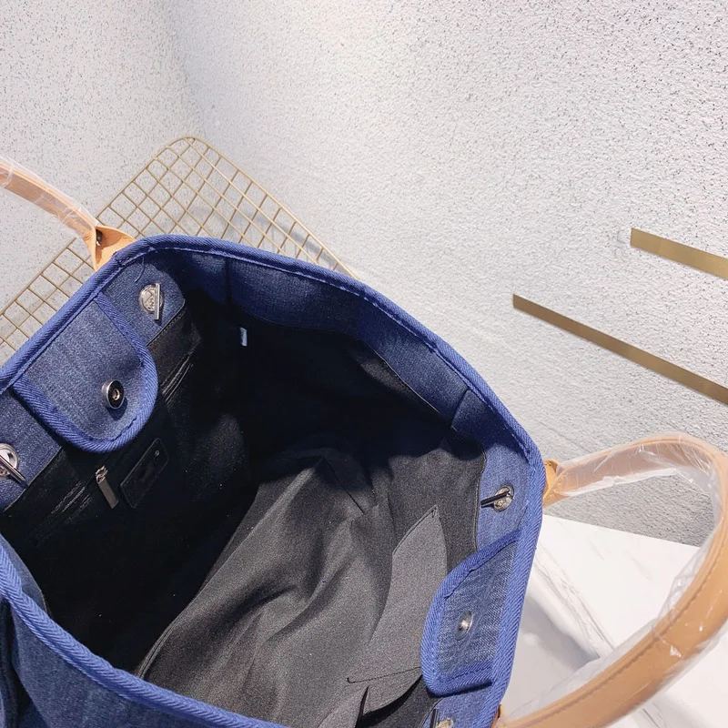 

101498 99 New women's leisure versatile canvas beach bag shopping bag high-end atmospheric capacity super cute Mommy bag