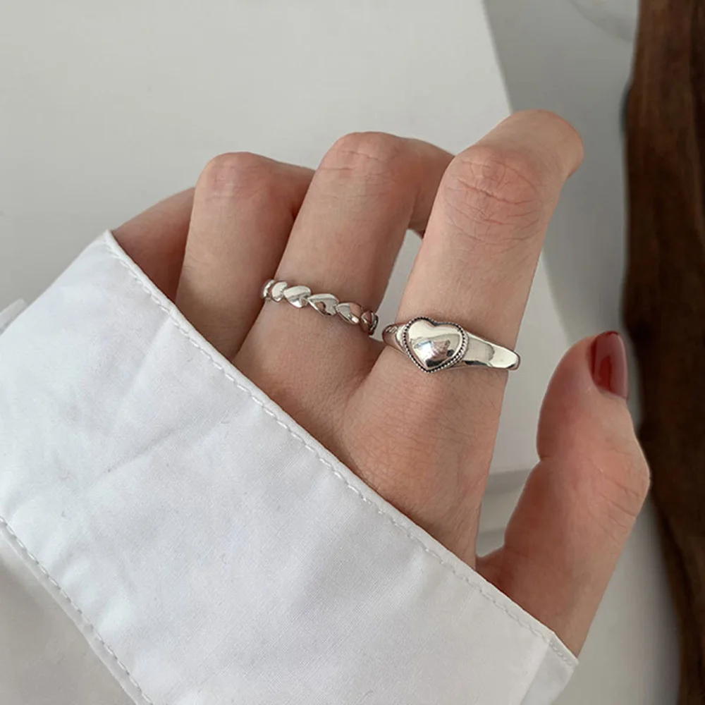 

2021 New Korean Vintage Hollowed-out Heart Shape Sad Face Silver Color Metal Rings for Women Couple Ring Jewelry Gifts Creative
