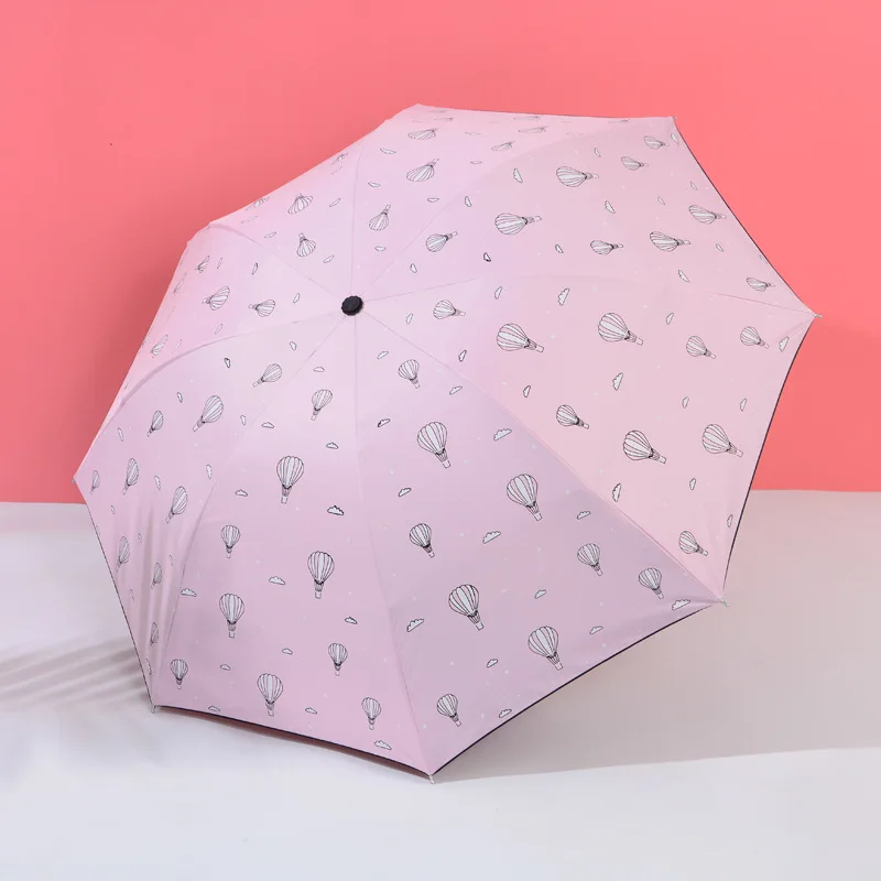 

Portable Folding umbrella black plastic sunscreen anti-ultraviolet three folding umbrella sunny rain umbrella strong umbrella